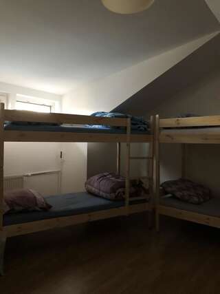 Хостелы Nyva House Варшава Спальное место на двухъярусной кровати в общем номере для мужчин и женщин-6